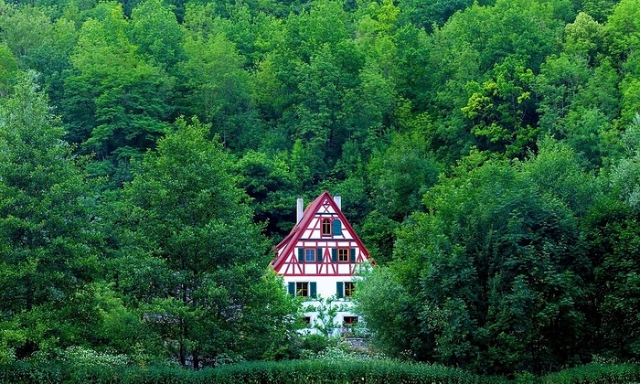 Germany Lonely half timbered house in the forest on the river Tauber below Rothenburg ob der Tauber, Bavaria, Germany, Europe, by Dirk v. Mallinckrodt