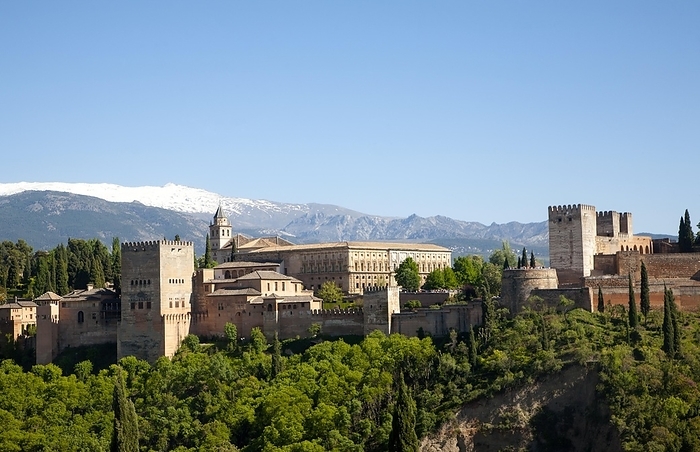 Spain Snow capped peaks of the Sierra Nevada mountains and the Alhambra, Granada, Spain, Europe, by Ian Murray