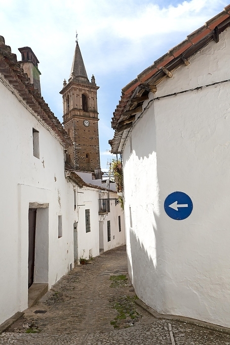 Spain One way road sign pointing down a very narrow street, village of Alajar, Sierra de Aracena, Huelva province, Spain, Europe, by Ian Murray