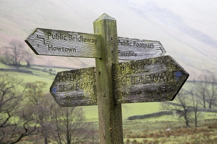 United Kingdom Wooden footpath pointer signpost at Howtown, Lake District national park, Cumbria, England, UK, by Ian Murray