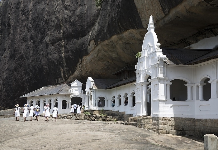 Sri Lanka People at Dambulla cave Buddhist temple complex, Sri Lanka, Asia, by Ian Murray