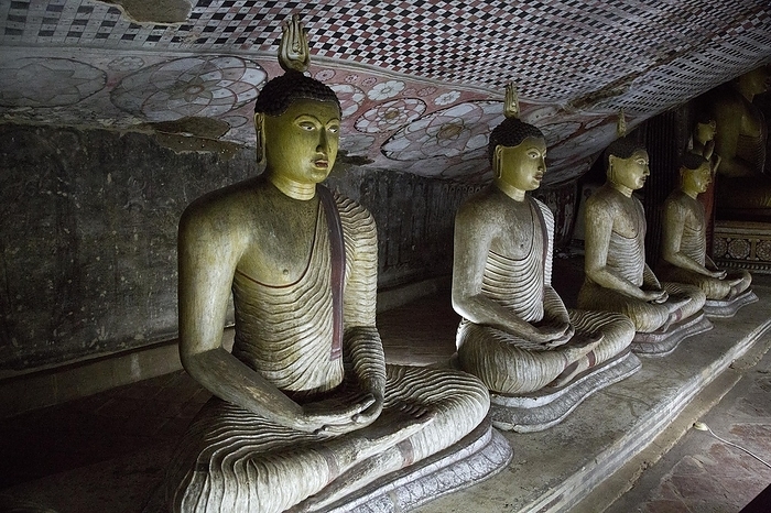 Sri Lanka Buddha figures inside Dambulla cave Buddhist temple complex, Sri Lanka, Asia, by Ian Murray