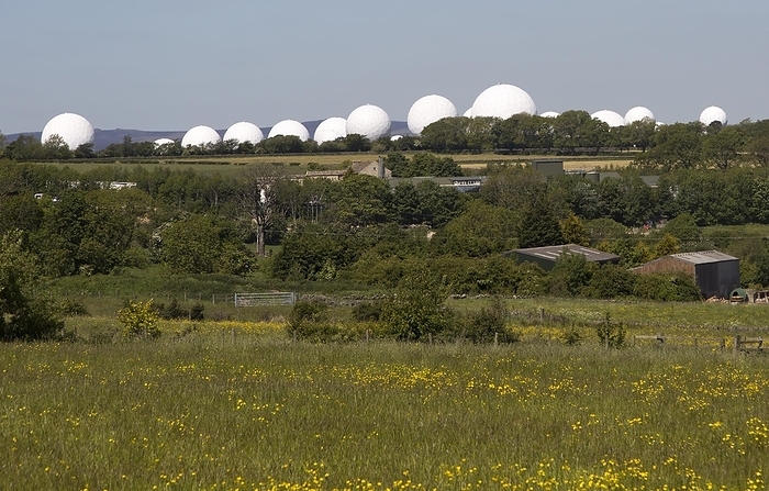 United Kingdom White circular radomes of satellite ground station, RAF Menwith Hill, North Yorkshire, England, UK, by Ian Murray