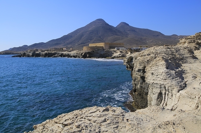 Spain Volcanoes and fossilised sand dune rock structure, Los Escullos, Cabo de Gata natural park, Almeria, Spain, Europe, by Ian Murray