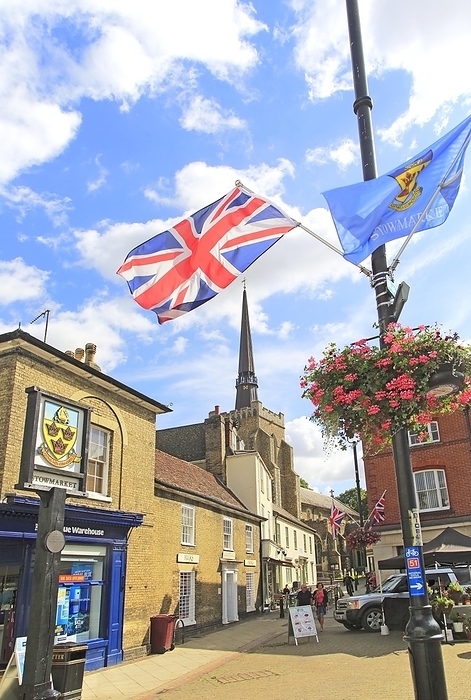 United Kingdom Flags frame view of spire St Peter and St Mary church in town centre, Stowmarket, Suffolk, England, UK, by Ian Murray