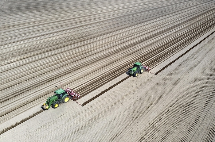 Aerial view, tractors sowing sunflower seeds, Thyrow, 21.04.2023, by Jochen Eckel