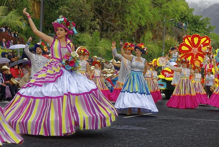 Group of feet, woman, flower decorations, colourful dresses, flower festival, Funchal, Madeira Island, by Klaus Lielischkies