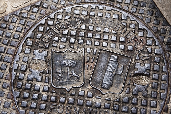 Italy Manhole cover with symbols, Alberobello, Valle d Itria, Apulia, Italy, Europe, by Norbert Eisele Hein