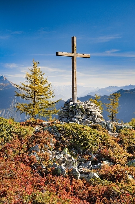 Switzerland View of the Valais mountains and the Rhone valley with summit cross in autumn, Lower Valais, Switzerland, Europe, by Patrick Frischknecht