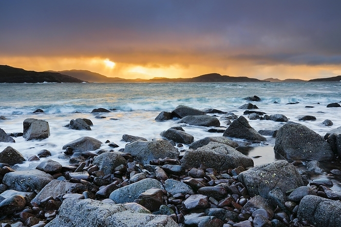 Scotland Atmospheric coloured cloudy sky at sunrise on a rocky beach near Reiff on the west coast of Scotland, by Patrick Frischknecht
