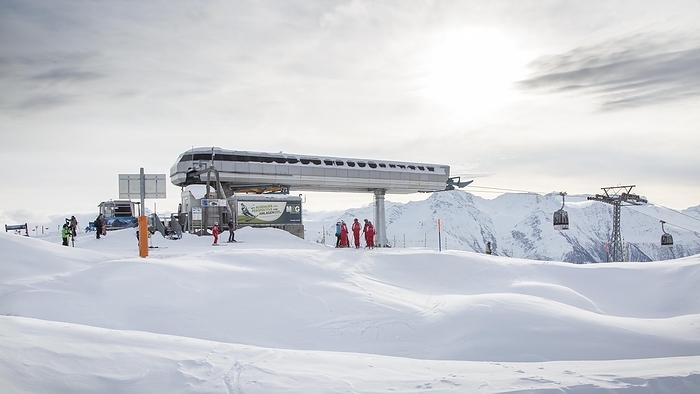 Switzerland Moosfluh gondola station and Swiss ski instructors gathering on top of ski slope near the Aletsch Glacier in winter, Riederalp, Wallis, Valais, Switzerland, Europe, by alimdi   Arterra