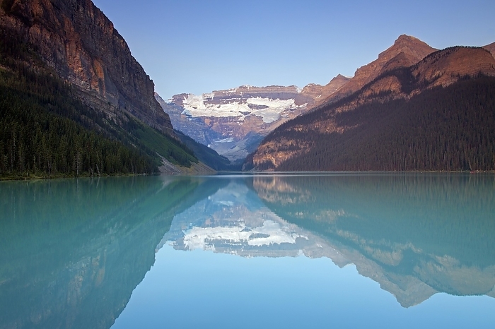Canada Glacial Lake Louise with Victoria glacier and mountains reflected in emerald water, Banff National Park, Alberta, Canada, North America, by alimdi   Arterra