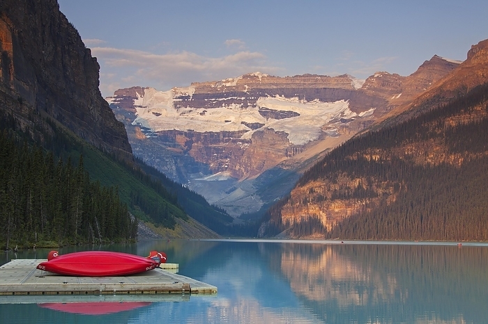 Canada Red canoes at glacial Lake Louise with Victoria glacier, Banff National Park, Alberta, Canada, North America, by alimdi   Arterra