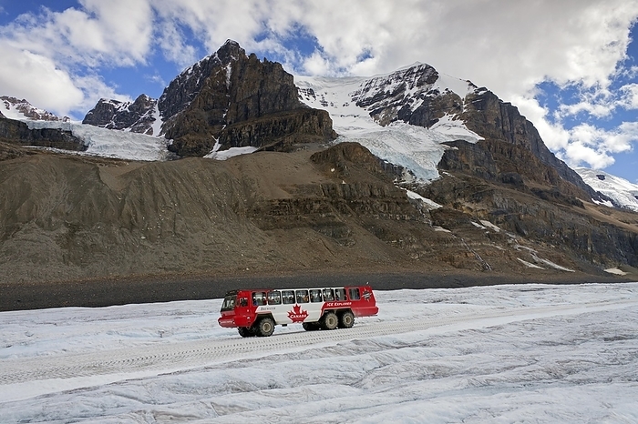 Canada All wheel drive, three axle snow coach with tourists on the retreating Athabasca Glacier, part of the Columbia Icefield in the Canadian Rockies, Jasper National Park, Alberta, Canada, North America, by alimdi   Arterra