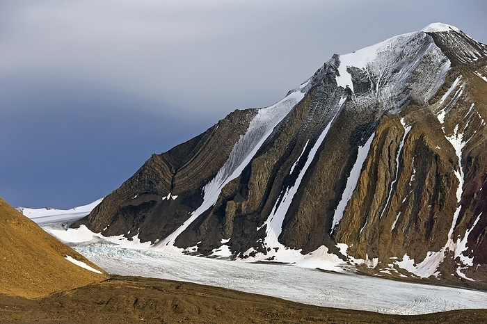 Samarinbreen glacier debouches into Samarinvågen, bay of the fjord Hornsund in Sørkapp Land at Spitsbergen, Svalbard, by alimdi / Arterra