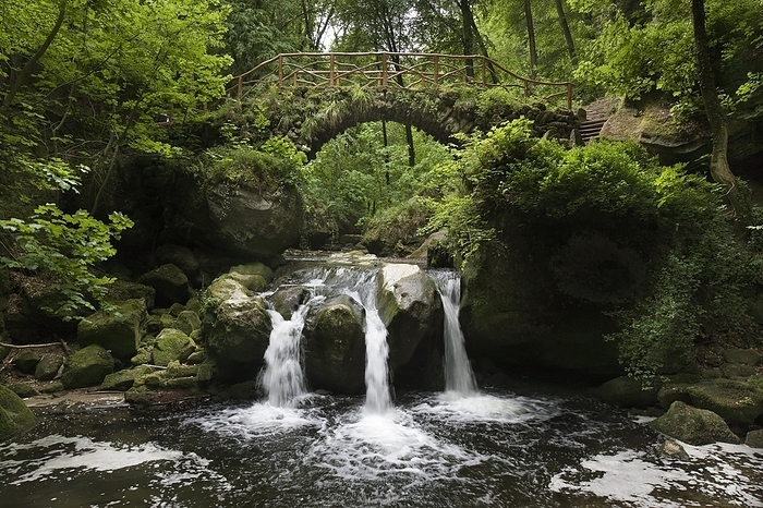 Luxembourg Cascade and old bridge Schiessent mpel over the Black Ernz in Little Switzerland, Mullerthal, Grand Duchy of Luxembourg, by alimdi   Arterra