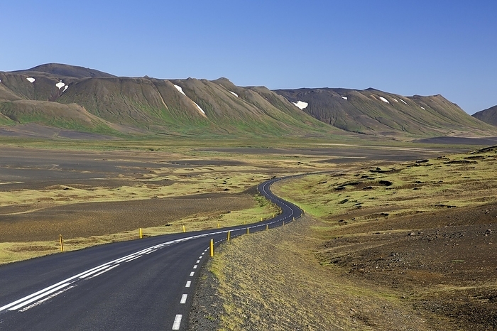 Iceland Empty Route 1, Ring Road, winding national road in desolate barren landscape in summer at Austurland, East Iceland, by alimdi   Arterra   Sven Erik Arndt