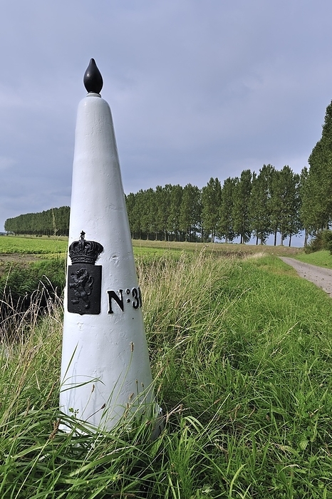 The Netherlands White boundary, border post between the Netherlands and Belgium in polder, Meetjesland, by alimdi   Arterra   Philippe Cl ment