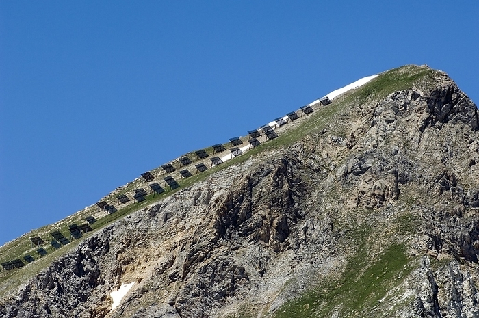 France Buttresses, snow fences on mountain slope to avoid avalanches in the Alps, France, Europe, by alimdi   Arterra   Philippe Cl ment