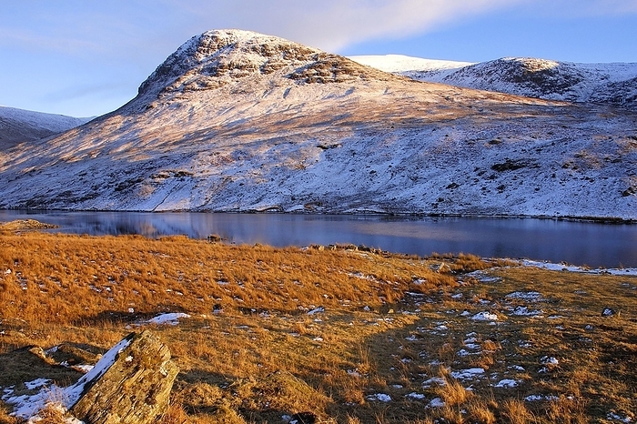 United Kingdom Snow covered hills and Loch Stronuich under a blue sky in upper Glen Lyon, Perthshire, Scotland, United Kingdom, Europe, by Klaus Steinkamp