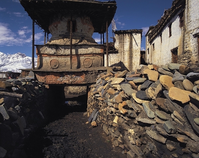 Nepal HUge chorten at the entrance to the hilltop Tibetan style fortress village of Jharkot in the Mustang region of west Nepal, by Klaus Steinkamp