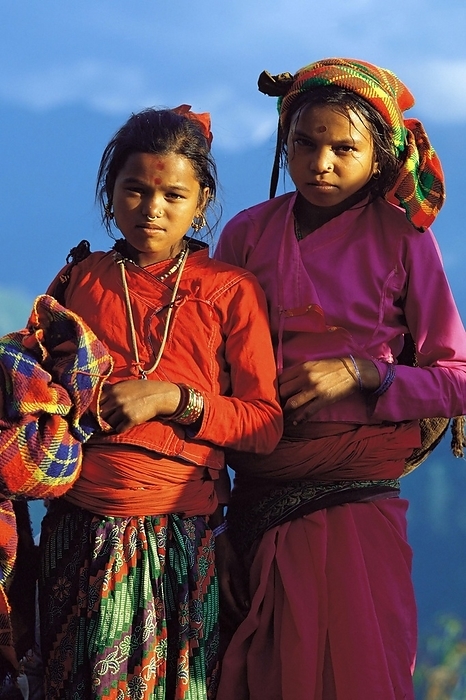Nepal Two Rai girls in their best clothes for Dasaain festival in Seduwa village in the Makalu region of east Nepal, by Klaus Steinkamp