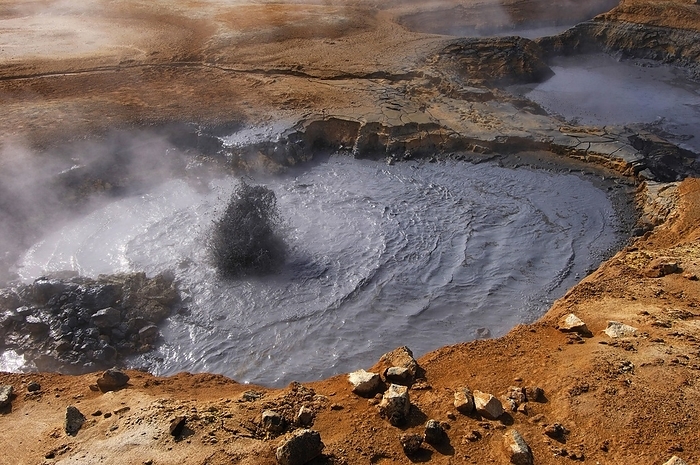 Iceland Boiling mud pool in a geothermal landscape at Hverarond near Myvatn, north Iceland, by Klaus Steinkamp