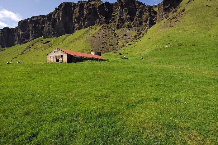 Iceland Barn or sheep shed beneath basalt crags near the farming township of Foss, southern Iceland, by Klaus Steinkamp
