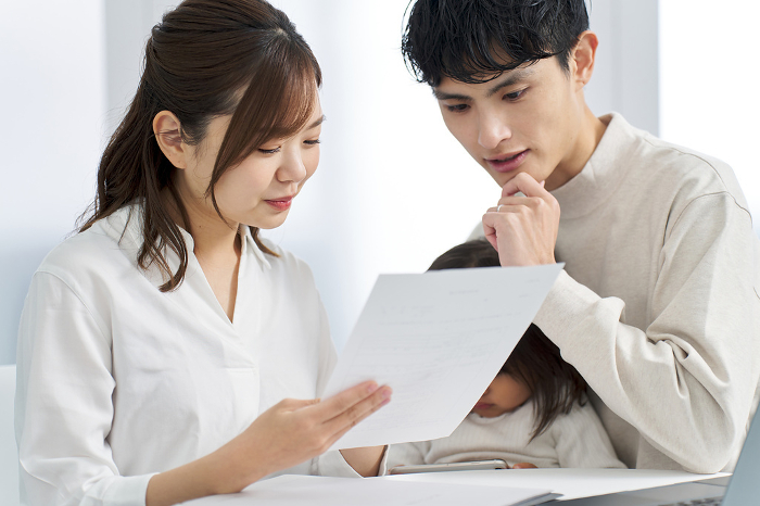 Japanese family considering purchasing insurance (Person)