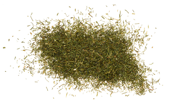 Dried dill scattered on isolated background, top view Dried dill scattered on isolated background, top view