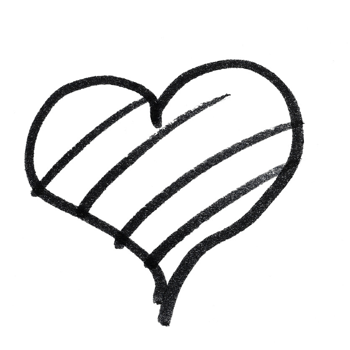 Drawn heart with black felt tip pen on white background Drawn heart with black felt tip pen on white background