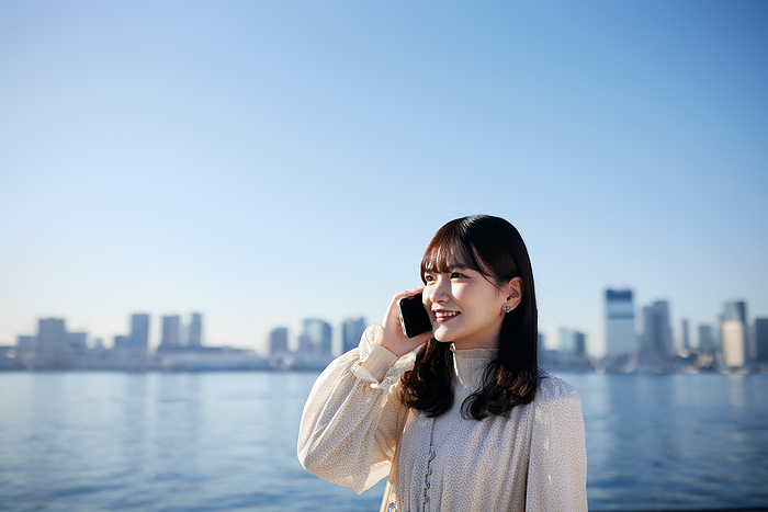 Japanese woman talking on her cell phone
