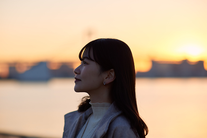 Sunset silhouette of Japanese woman