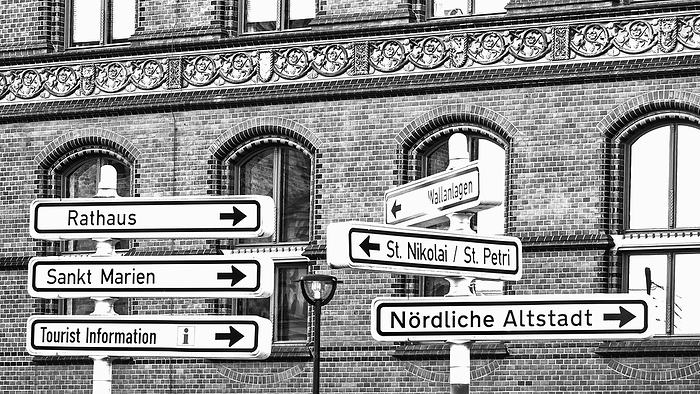 Signs to the points of interest of city Rostock, Germany, monochrome Signs to the points of interest of city Rostock, Germany, monochrome, by Zoonar Katrin May