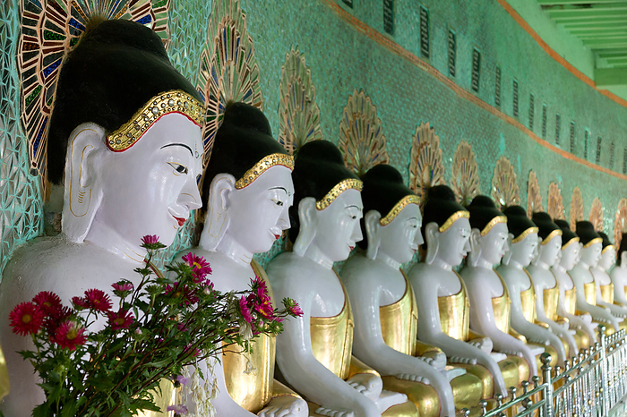 Buddha statues in the Umin Thounzeh Temple in Sagaing Buddha statues in the Umin Thounzeh Temple in Sagaing, by Zoonar Andreas Edelm