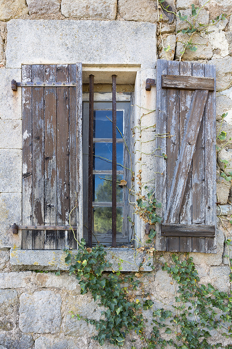 Window on old stone house in France Window on old stone house in France, by Zoonar Harald Biebel
