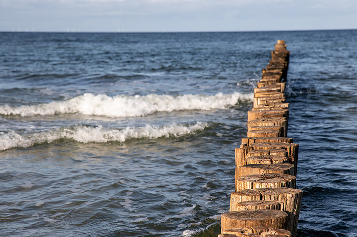old groynes from above baltic sea beach old groynes from above baltic sea beach, by Zoonar dk fotowelt