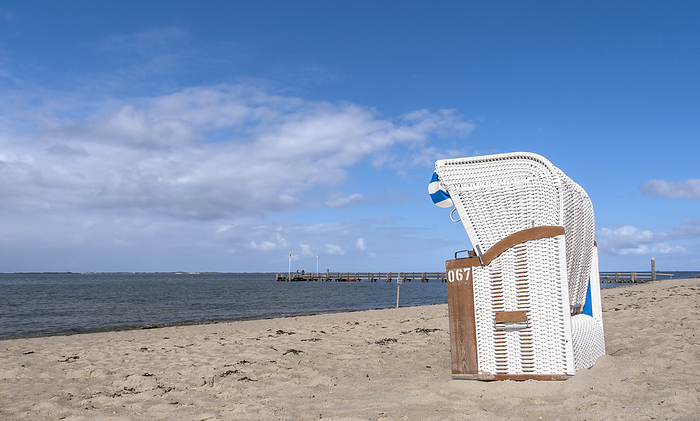 White beach chair on the beach of Utersum, F hr White beach chair on the beach of Utersum, F hr, by Zoonar Anna Reinert