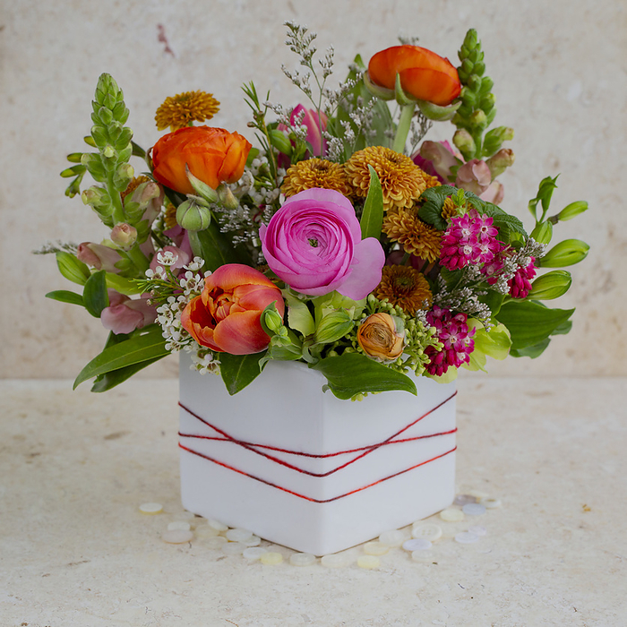 NA Colorful floral arrangement in square vase  Studio Shot, by Lorna Rande   Design Pics