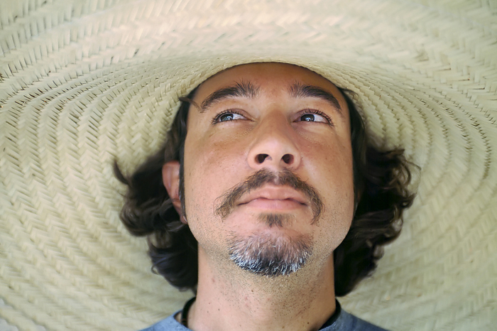 JOSAR_Daniel_DeGranville_Manco Brazilian man wearing a large brimmed hat  Pantanal Region, Brazil, by Joel Sartore Photography   Design Pics