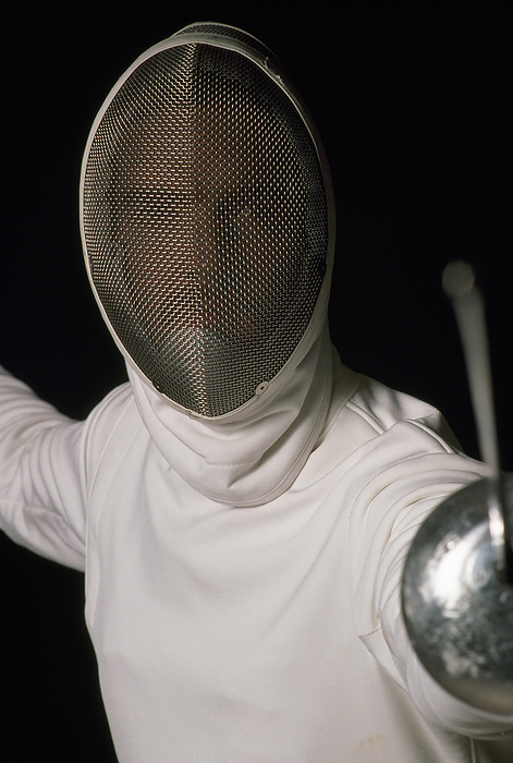 NA Fencer in full uniform extends his sword  New York City, New York, United States of America, by Michael Melford   Design Pics