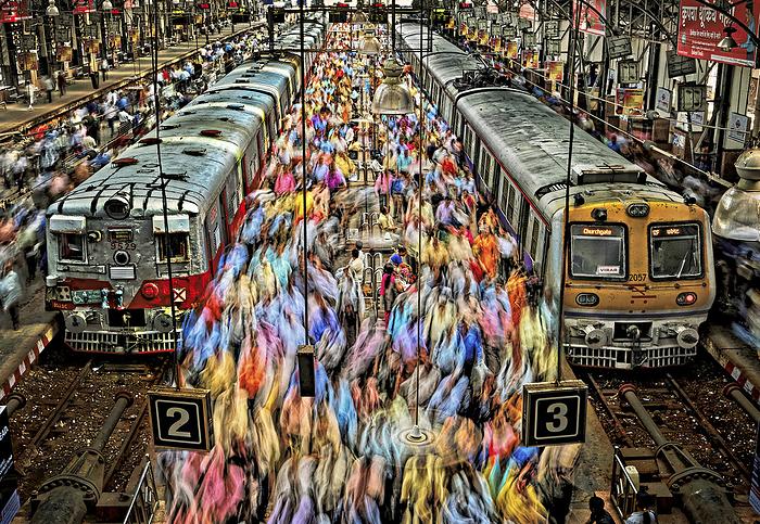 NA Crowds at the Churchgate Railway Station in Mumbai flow between the trains. By 2030 it is estimated that 60   4.9 billion  worldwide will live in cities  Mumbai, Maharashtra state, India, by Randy Olson   Design Pics