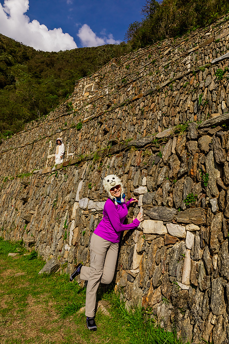 Woman at the llama wall at Choquequirao Woman at the llama wall at Choquequirao, Peru, South America, by Laura Grier