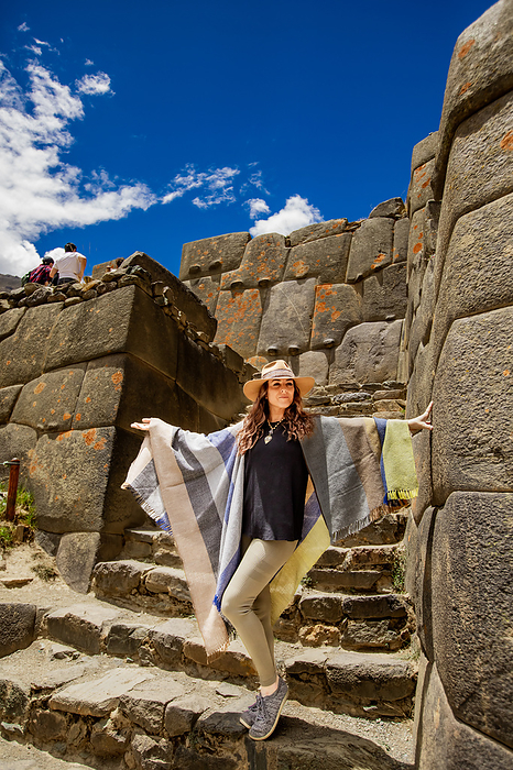 Woman on trail near Ollantaytambo Woman on trail near Ollantaytambo, Peru, South America, by Laura Grier
