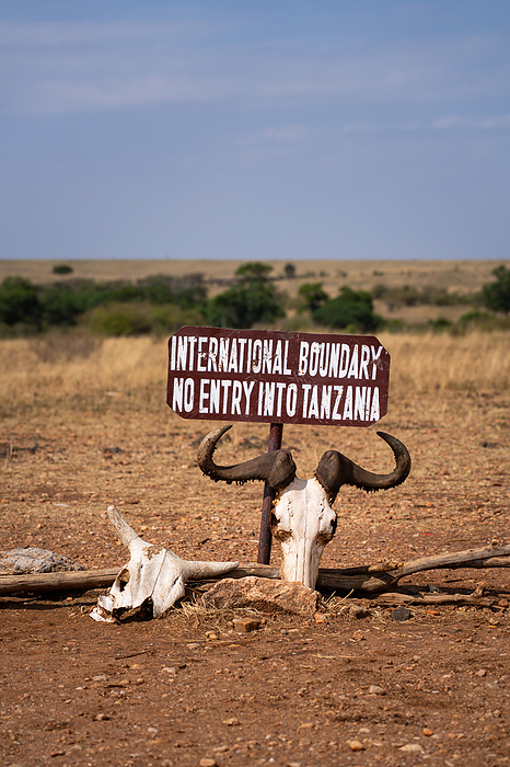 The international border between Tanzania and Kenya in the Maasai Mara, Kenya The international border between Tanzania and Kenya in the Maasai Mara, Kenya, East Africa, Africa, by Spencer Clark