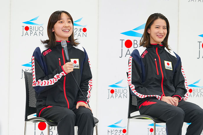 Athletes confirmed for Japan s national swimming team for the Paris Olympics press conference  Swimming team press conference Sansei Narita  right: Yui Ohashi  answers questions with a smile  Photo by Tomomi Aizu .