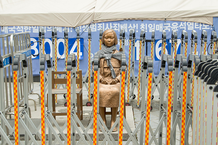 The Statue of Peace in front of the Japanese embassy in Seoul The Statue of Peace, Mar 20, 2024 : The Comfort Women Statue or the Statue of Peace symbolizing Korean Comfort Women or sex slaves by Japanese military during the Second World War, is seen barricaded by the police as a pro Japanese right wing civic group stages a protest demanding removal of the statue in front of the Japanese embassy in Seoul, South Korea. Another group of activists held  Wednesday Rally  near the embassy to call for Japanese government s official apology and compensation for the victims of the Japanese military s sexual slavery during the World War II.  Photo by Lee Jae Won AFLO 