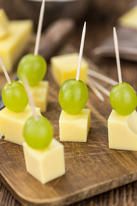 Cheese blocks with grapes  partyfood  Cheese blocks with grapes  partyfood , by Zoonar Christoph Sch