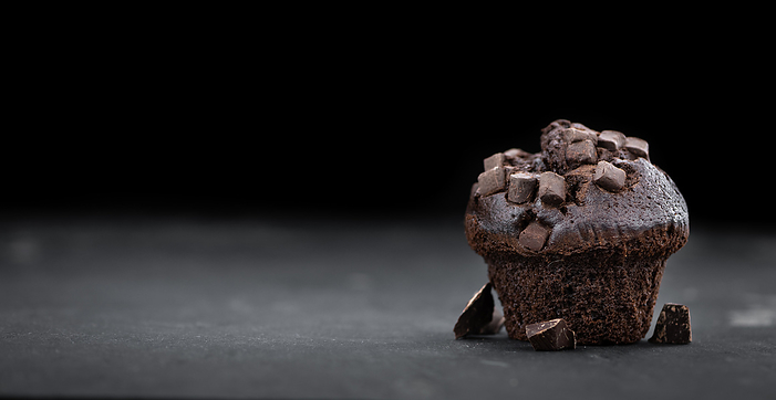Fresh made Chocolate Muffins on a slate slab  close up shot  selective focus  Fresh made Chocolate Muffins on a slate slab  close up shot  selective focus , by Zoonar Christoph Sch