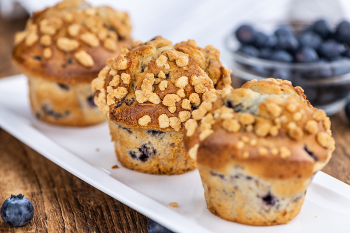 Blueberry Muffins  selective focus  detailed close up shot  Blueberry Muffins  selective focus  detailed close up shot , by Zoonar Christoph Sch